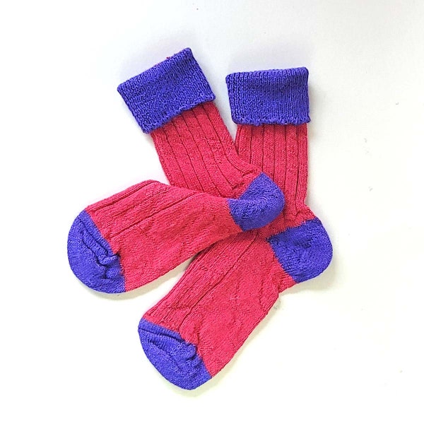 Pink and purple alpaca snuggly bedsocks.