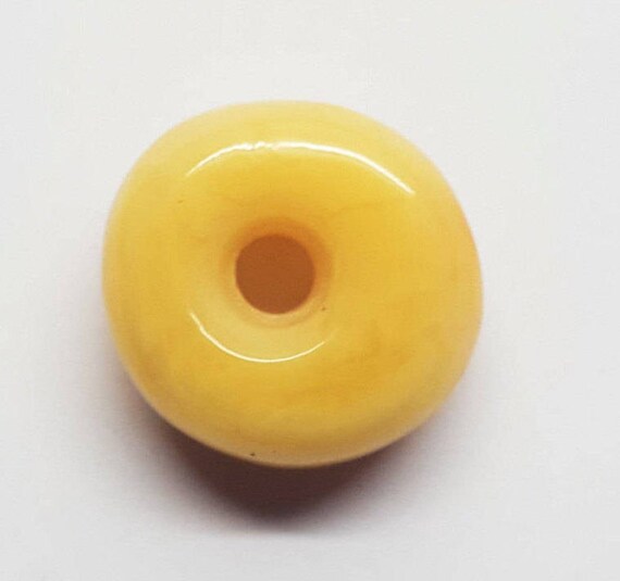 Amber donut pendant