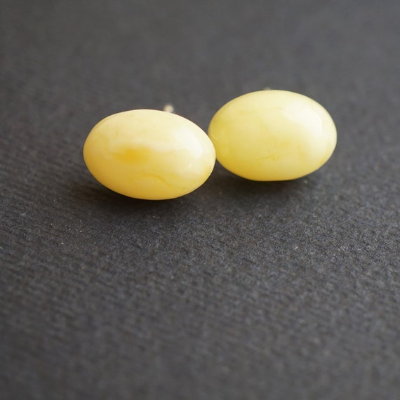White Natural baltic amber stud earrings