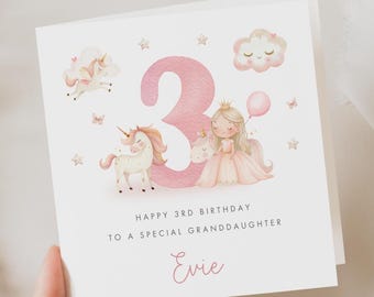 May include: A square birthday card with a pink number 3, a princess, unicorns, and the text "Happy 3rd Birthday To A Special Granddaughter Evie". The card has a white background with watercolor illustrations.