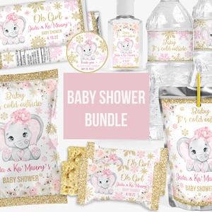 May include: A baby shower party favor bundle featuring a pink and gold elephant theme with snowflake accents. Items include candy bar wrappers, a round sticker, a hand sanitizer label, water bottle labels, chip bags, and a juice pouch label.