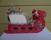 Vintage Santa Claus in a Vintage Sleigh