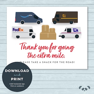 May include: A white ceramic mug with a black handle and the text "But First, Coffee" in a black, bold font. The mug is on a white surface.