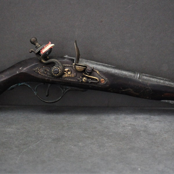 Vintage REPLICA FLINTLOCK PISTOL. Wall Decoration, Hardwood with Brass Furniture and Decoration.