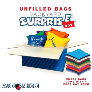 May include: A blue box with the text "UNFILLED BAGS BACKYARD SURPRISE BOX" on the top. The box is open and contains a stack of colorful bean bags. The text "AJJ CORNHOLE" is on the bottom left of the image. The text "EMPTY BAGS COME WITH 1 EDGE NOT SEWN" is on the bottom right of the image.