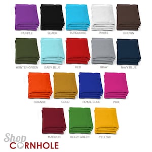 May include: A set of 16 bean bags in various colors, including purple, black, turquoise, white, brown, hunter green, baby blue, red, gray, navy blue, orange, gold, royal blue, pink, maroon, kelly green, and yellow. The bean bags are stacked in rows of four, with the color names printed below each row. The text "Shop Cornhole" is printed at the bottom of the image.