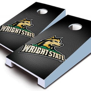 May include: Two black and green cornhole boards with a white wolf logo and the text "Wright State" on each board.