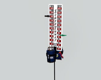 May include: White score tower with red and black stripes, numbered 1 to 21. The tower has a blue drink holder with a can inside. There are also colorful clips attached to the tower.