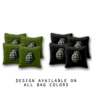 May include: Set of green and black bean bags with a grenade design. The bean bags are arranged in two rows, with the green bean bags in the front and the black bean bags in the back. The bean bags are all the same size and shape.