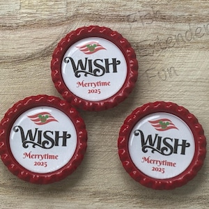 May include: Three red bottle cap-shaped buttons with a white center. The center of each button has the word "WISH" in a stylized font, with "Merrytime 2025" below. A red and green graphic is above the word "WISH".