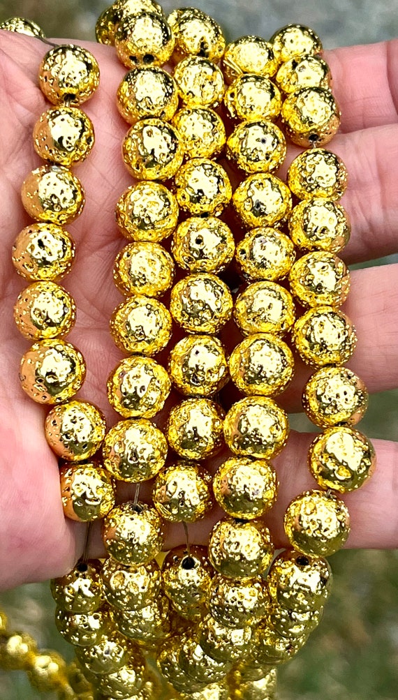 Gold lava beads deals