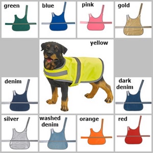 May include: A dog wearing a yellow safety vest with reflective strips. The vest is available in a variety of colors, including green, blue, pink, gold, denim, dark denim, silver, washed denim, orange, and red.