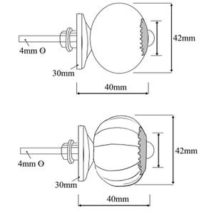 May include: Two round door knobs with a 4 mm diameter hole. The knobs are 40 mm wide and 42 mm tall. The knobs have a decorative design on the front.