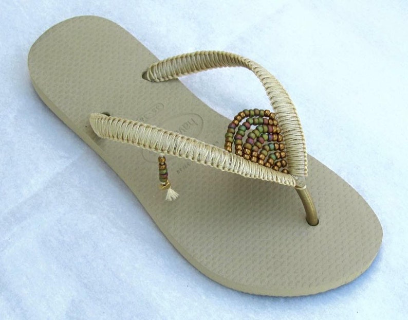 gold flip flops amazon