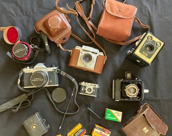 6 vintage cameras with extras