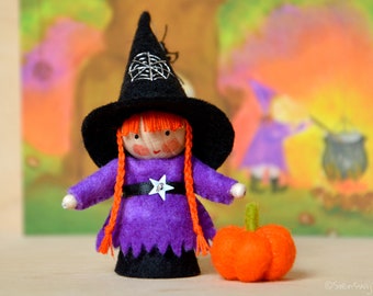 Witch handmade out of wool felt and wool. Waldorf inspired for on the nature table.