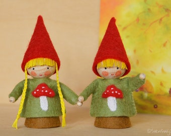 Two little gnomes in the autumn handmade out of wool felt and wool. Waldorf inspired for on the nature table.