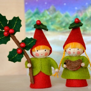 Two small Christmas gnomes with holly and robin made of wool felt, Waldorf inspired for on the nature table.