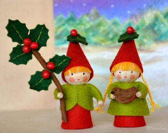 Two small Christmas gnomes with holly and robin made of wool felt, Waldorf inspired for on the nature table.