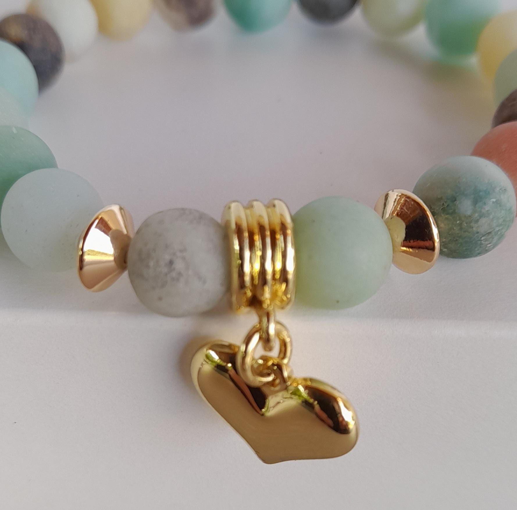 Bracciale da donna in pietre naturali, perle di madreperla bianca e perle placcate oro - Italia