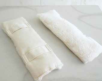 Vadderade kuddar för sele från Straitjacketshop i Ecru / Rosa / Blå och Svart