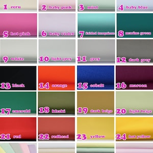 May include: A grid of twenty-four fabric swatches labeled with numbers and color names including ecru, baby pink, mint, baby blue, hot pink, baby violet, faded turquoise, marine green, white, light grey, grey, dark grey, black, orange, cobalt, maroon, emerald, khaki, dark beige, light beige, red, redhead, yellow, and hot yellow.