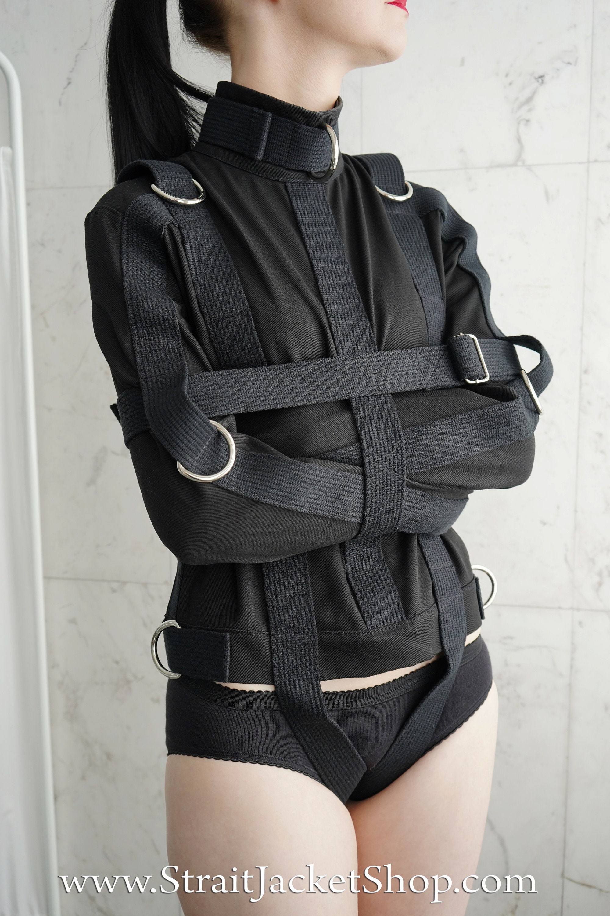 BDSM Denim Straitjacket with heavy duty leather straps.
