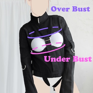 May include: Black long-sleeved jacket with straps and buckles. The jacket has a high collar and is cropped at the waist. The text "Over Bust" and "Under Bust" is written on the jacket.
