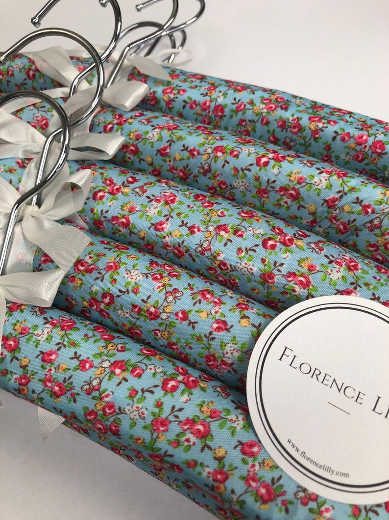 Florence Padded Clothes Hangers in Sets of 5 or 10 with the Bow Ribbon Detail, and a Swivel Hook by Florence Lilly FLORENCE BLUE