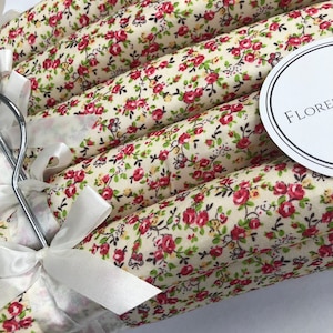 Florence Padded Clothes Hangers in Sets of 5 or 10 with the Bow Ribbon Detail, and a Swivel Hook by Florence Lilly FLORENCE CREAM