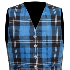 May include: A blue, black, and white plaid vest with silver buttons. The vest has a pointed bottom and a V-neck.