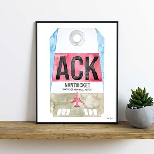 May include: A watercolor painting of a luggage tag with the airport code "ACK" and the text "NANTUCKET NANTUCKET MEMORIAL AIRPORT".
