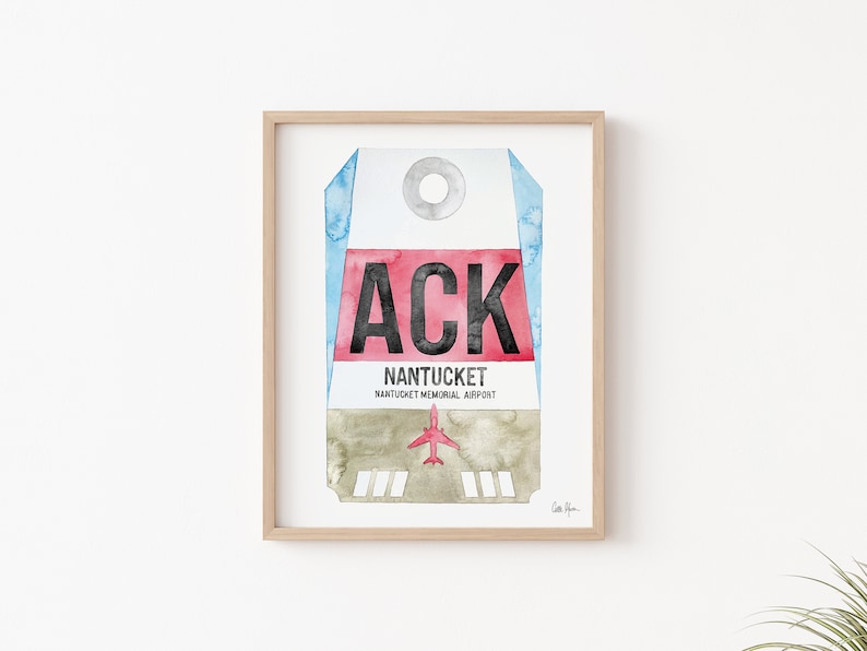 May include: A watercolor painting of a luggage tag with the airport code "ACK" and the text "NANTUCKET, NANTUCKET MEMORIAL AIRPORT". The tag is red, white, and blue with a small airplane in the bottom center.