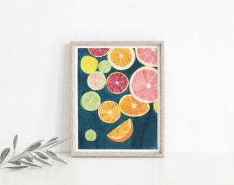 May include: A framed watercolor painting of citrus fruit slices on a teal background. The slices include oranges, grapefruits, lemons, and limes.