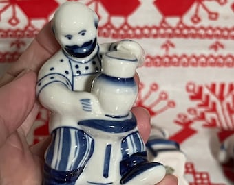 Gzhel miniature figurines Moscow Russia early 1990s souvenir porcelain figurine Folk art Russian ceramics Potter Couple on phone