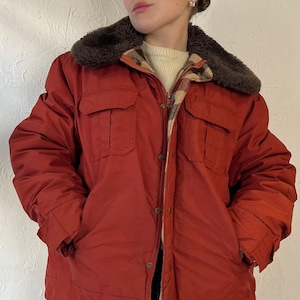 Vintage ‘Woolrich’ Orange Puffer Jacket / Large