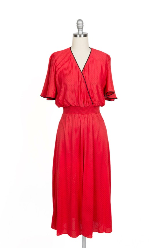 red polka dot tea dress