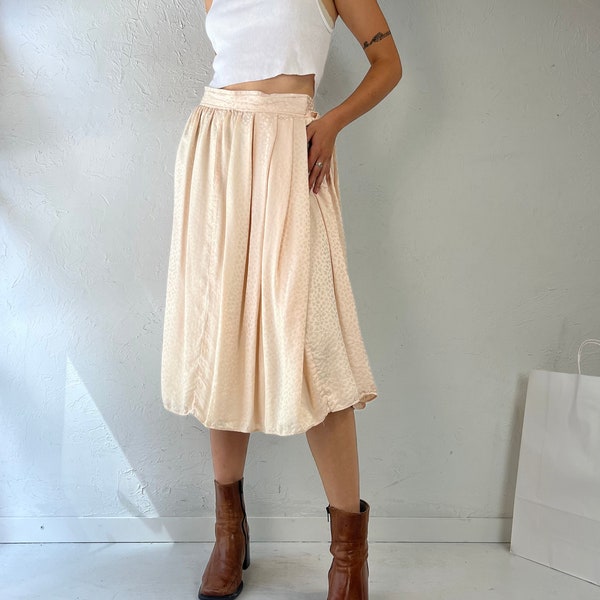 vintage jupe mi-longue en soie gaufrée rose pâle / petit