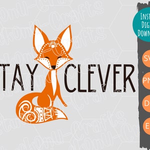 May include: Orange fox with a white belly and a geometric pattern on its tail sitting on a gray background with the text "STAY CLEVER" in black.