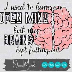 May include: A black and white graphic design with a pink brain illustration. The text reads "I used to have an open mind but my brains kept falling out."  The text "Open Mind" is written in a cursive font below the graphic. The text "SVG PNG DXF EPS" is written in a blue circle below the text "Open Mind".
