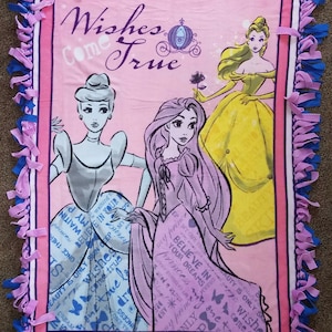 Wishes Come True, Believe in Your Dreams Disney Princesses Cinderella, Rapunzel, and Belle Fleece Tie Blanket with Blue Backing