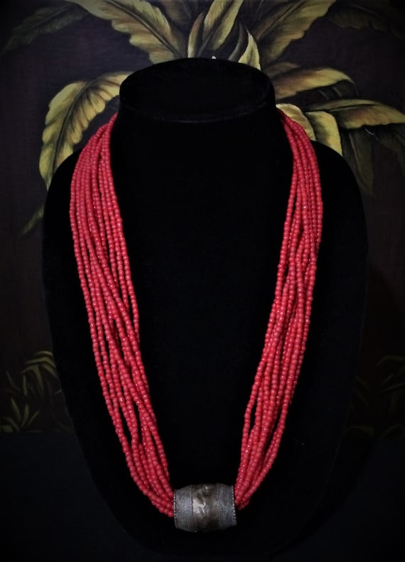 Antique ten strand red bead necklace.