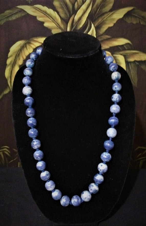 Big blue lapis bead necklace.