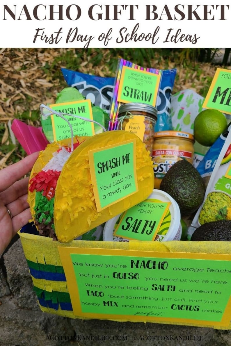May include: A yellow and blue basket filled with a variety of snacks and a taco pi&ntilde;ata. The basket is decorated with a sign that reads "NACHO average Teacher, but just in QUESO you need us we're here. When you're feeling SALTY and need to TACO 'bout something, just call. Find your happy MIX and remember CACTUS makes perfect."