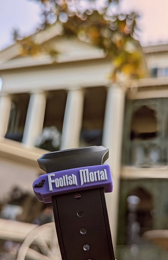 FOOLISH MORTAL sliding PVC charm for use with Magic Bands | Haunted Mansion | soft | MagicBand flexible fastener accessory