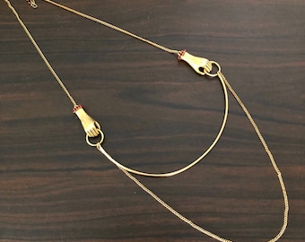 Collares de manos hechos a mano