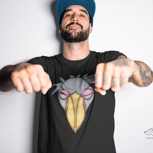 Proteger la camisa de los pájaros, camiseta de dibujos animados de pájaros, camisa de pájaro, camisa de pájaro de combate, camiseta amante de los pájaros, camisa de combate, dinosaurio cigüeña zapato