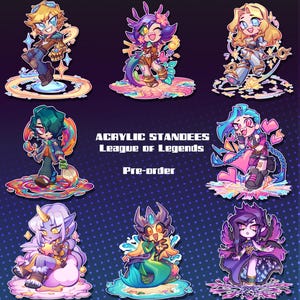May include: Acrylic standees featuring League of Legends characters. The image shows colourful chibi-style illustrations of various champions, each standing on a vibrant, stylized base. The text "Acrylic Standees League of Legends Pre-order" is displayed.