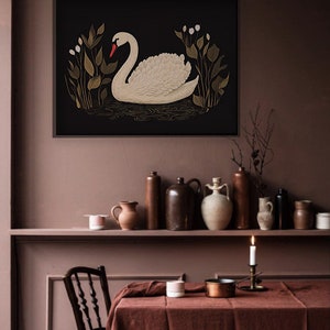 May include: A black and white illustration of a swan swimming in a pond with green foliage. The swan is white with a red beak and is facing left. The background is black.