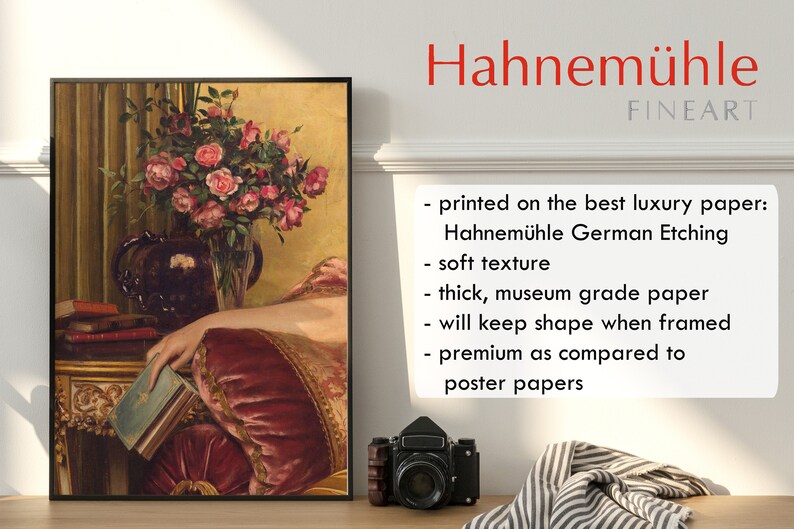May include: A framed painting of a woman's hand resting on a red velvet cushion. A bouquet of pink roses in a vase is in the background. The painting is printed on Hahnem&uuml;hle German Etching paper, a high-quality paper known for its soft texture and archival quality.